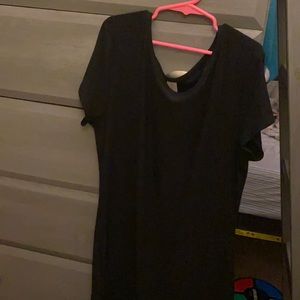 tight black dress, soft, comes before knees.